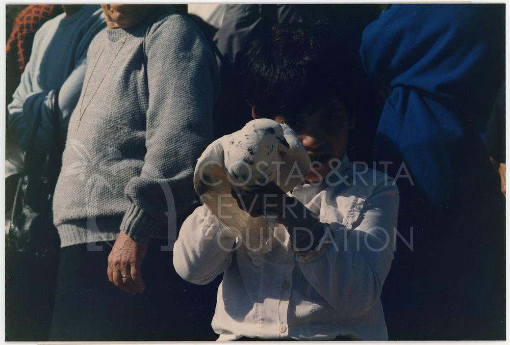 A child holding a dove-pht_ETC_00300
