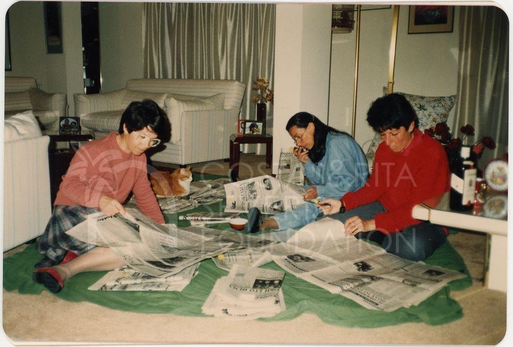 Reading the newspapers-pht_ETC_00582