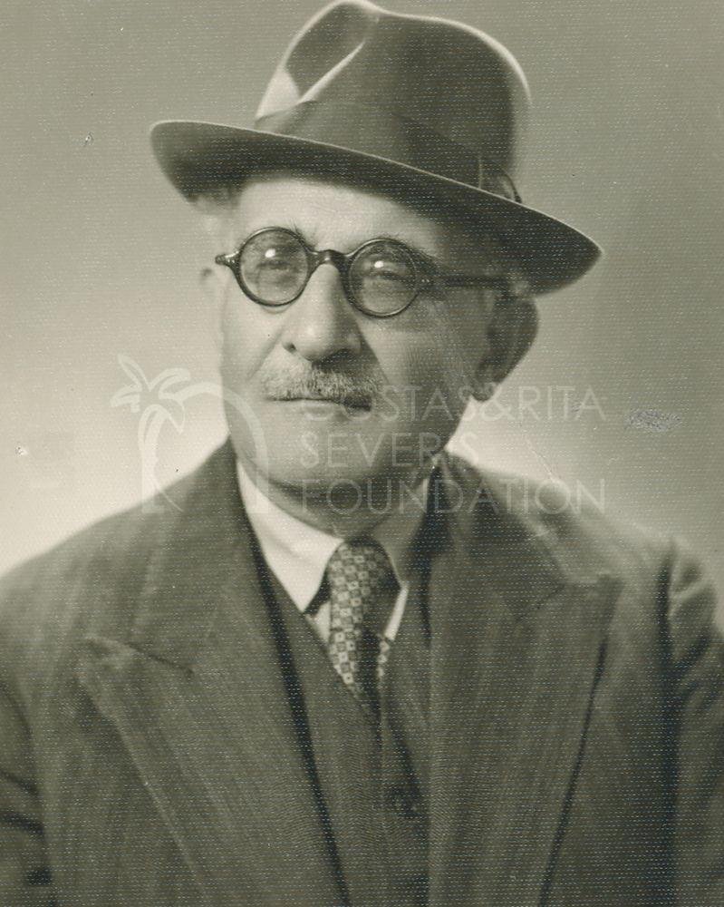 Portrait of George Markides wearing a hat-pht_GM_110