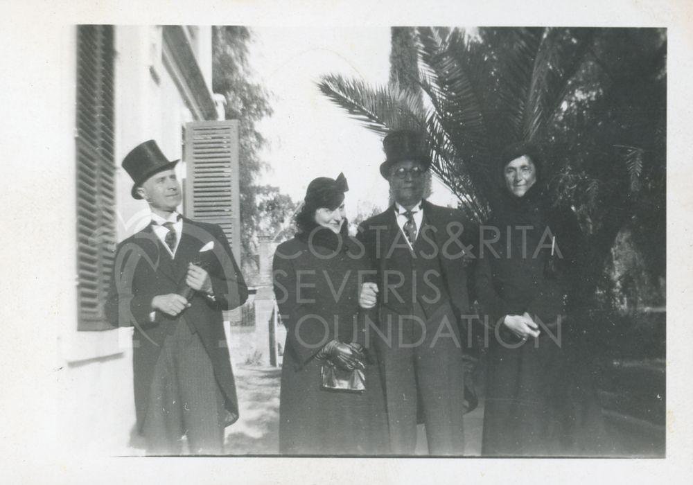 Two men in top hats with two women-pht_GM_115