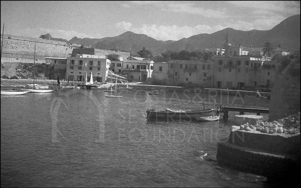 Kyrenia Harbour. Most of the buildings then were warehouses but have now been turned into restaurants and expensive living accommodation-pht_RC_104