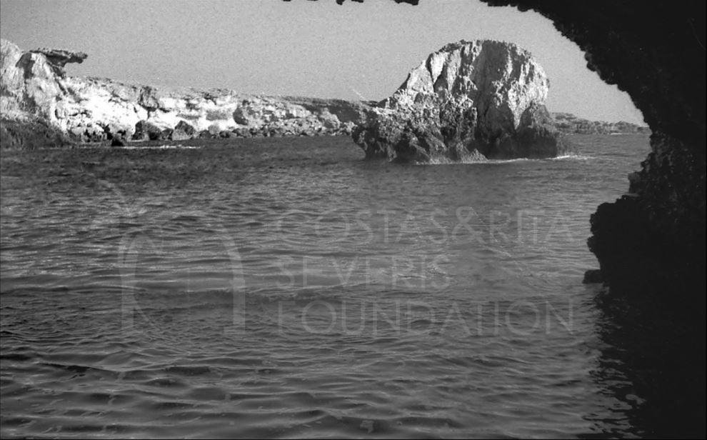 The lovely rocky coastline and clear blue seas looking out of from one of the caves at Agia Napa-pht_RC_157